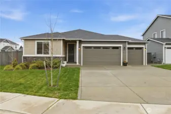 Beautiful 4 bedroom home in the Sunrise Community! 3 car garage & lots of parking!