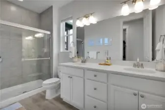 Primary bath with walk in shower & double sinks ~