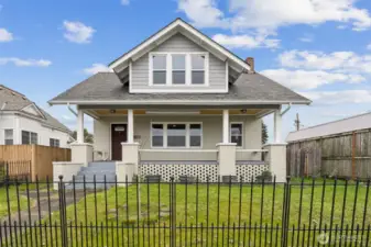 Enjoy the large covered patio and fully fenced yard