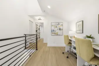 Upstairs landing - use as a homework station or cozy nook for reading.