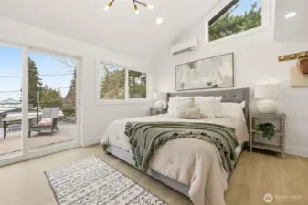 Primary suite has plenty of room and a private deck for morning coffee or watching the sunset with your favorite beverage.