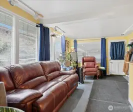 Bonus room has entry door from the carport