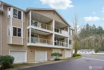 Tandem garage parking located behind the building