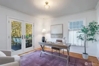 Main floor office opens to large deck - lovely Southeast exposure here.