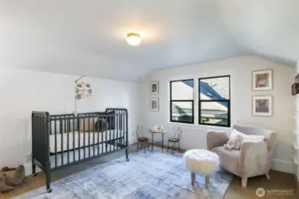 Right across the landing, here's the second of three upstairs bedrooms. Built in dresser and good-size closet.