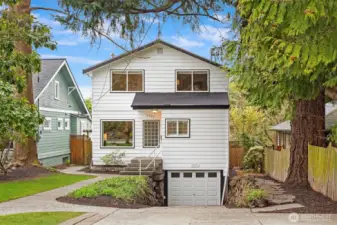 Sitting way back from the street, just moments from Lincoln Park and Morgan Junction, welcome home! At least 4 off street parking spots and a one car garage! The perfect West Seattle dream home!