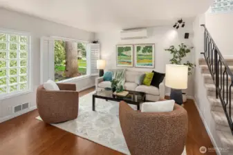 Another view of the front room with glass block light wall.