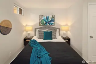 The basement bedroom also can fit a king bed and is wonderful for guests.