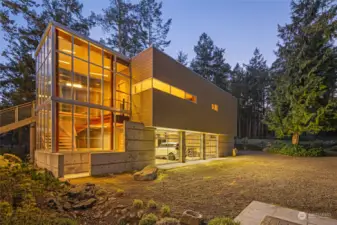 Guest house and garage at dusk