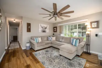 just down the hall you will find 3 bedrooms and updated bathroom.