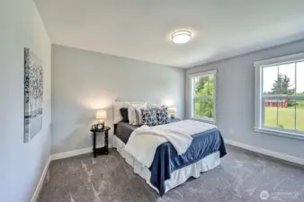 Third bedroom upstairs overlooking the property.
