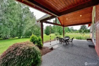 Entertain guests or fire up the BBQ on this covered back patio.