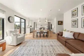 View of the Living space/Kitchen with the gas fireplace directly behind the POV.