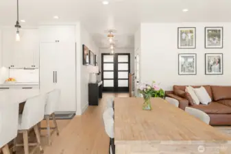 View of the entrance to the home with the glass slider to the backyard directly 180 degrees from the POV.