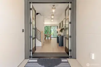 There are no steps into the home and the In-Law Suite is immediately to the left.