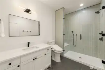 In-Law Suite bathroom with a zero step walk-in shower.