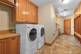 Room for everything in this mudroom/laundry room! Enter right from 3 car garage!