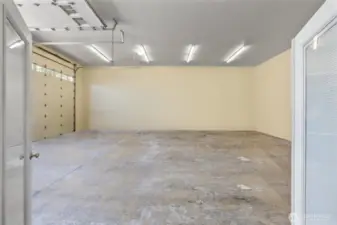 This is looking into the HUGE Shop from the Studio. Built-in shelving (not in picture) stays in shop.