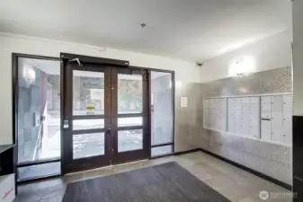 Packages are delivered to the left in this photo, mail to the right.