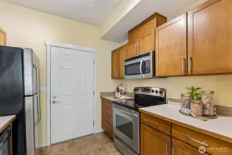 Garage entrance off kitchen -- so convenient for taking out the garbage!