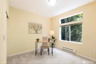 Used and staged as an office, this is the 2nd bedroom, with a closet inside to the left.