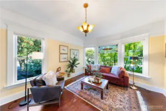 Large picture windows for natural light and to enjoy the blooming flowers.