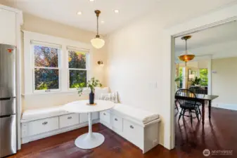 Built in window seating and storage space.  Please note the extra electrical outlets in the seating, designed for your convenience. Original lighting fixtures add so much charm to this very special home.