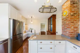 New Quartz countertops, don't miss the prep sink, all new drawers and cabinets.  Newer appliances.  Clean, light and bright.  Move-in Ready.