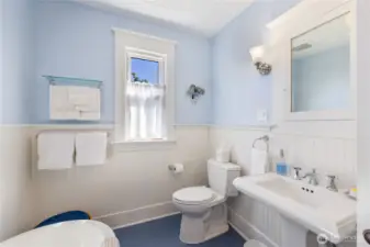 There's a built-in medicine cabinet and original mill work with updated plumbing and light fixtures.