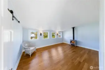 Here is a large Bedroom with walk-in closet and gas fireplace.