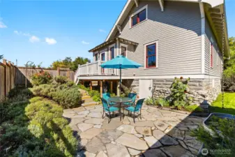 You can enjoy snacks with friends in your own private backyard sanctuary That door in the distance is the Basement access with a huge storage space.