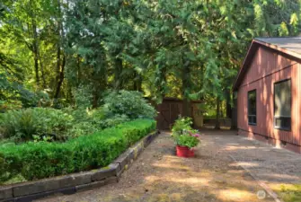 sideyard with brick patio.