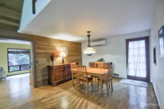 Dining room with door to outside.