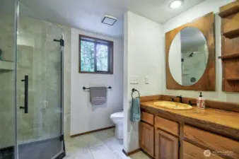 Glass shower stall.