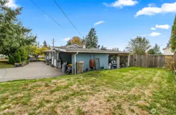 North Side of the Home~Enclose the Carport~Adding Square Footage to the Home & Build a New Garage~Buyer to Verify