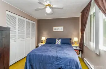 Closets line the wall of the Primary Bedroom