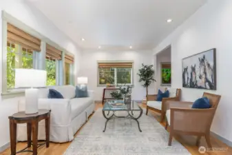 Bright, clean lines and wood floors avail a living room space, perfect to create your own vision.