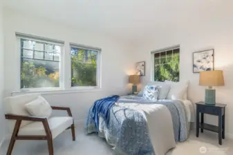 Bedroom overlooks a lovely backyard! New carpet too!