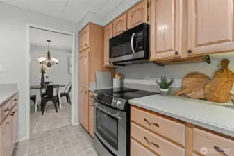 Sleek electric range with smooth cooktop and built-in oven, offering reliable performance and easy cleanup—perfect for everyday cooking and entertaining alike.