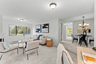 The living room flows effortlessly into the dining area, creating an ideal layout for everyday living and entertaining.