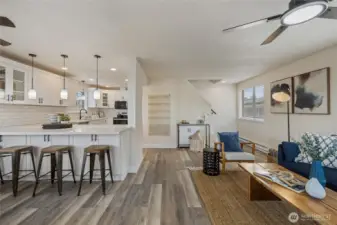 Welcoming living & dining rooms with open concept kitchen. New LVP flooring throughout.