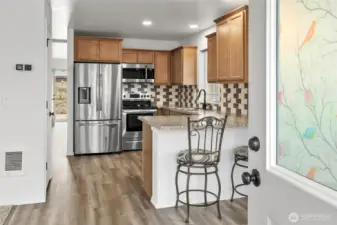 Front entry leads into the open floor plan.