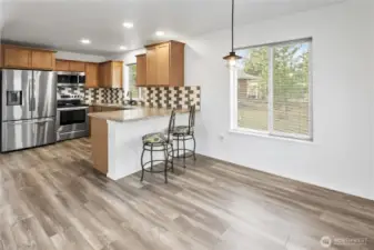 Dining room and kitchen.