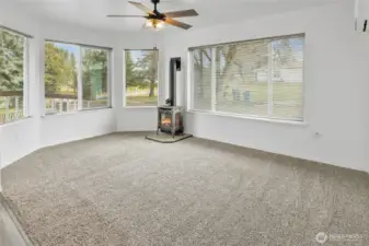 Lots of windows for natural light and the gas fireplace to enjoy.