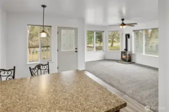 Kitchen view as you look at living and dining room.