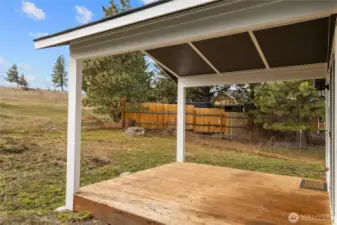 Enjoy the large covered deck to relax and unwind.