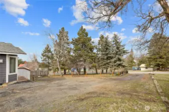 Driveway with NW views with some mature trees plus, territorial views.