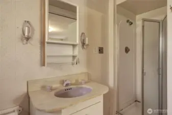 Yes - unique lavender vanity does stay with the home!