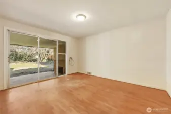 Third bedroom connects the home to the covered patio out back.