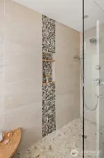 Beautiful walk-in shower with frameless glass wall